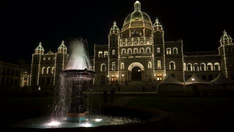 The-Parliament-Building-and-the-seat-of-the-Legislative-Assembly-shines-at-night-fully-illuminated-with-fountain-at-night