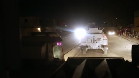 United-Nations-night-mission-in-streets-of-Port-au-Prince,-Haiti