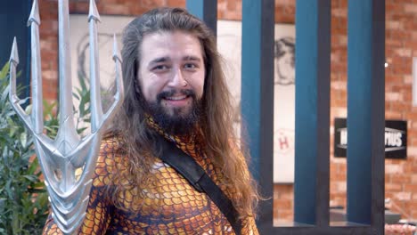 Slowmotion-shot-of-a-man-cosplaying-as-Aquaman-at-the-Japanese-Exhibition-in-Paris