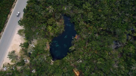 Rising-aerial-view-of-a-private-swimming-hole-in-Mexico