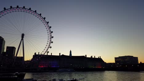 Motion-lapse-sunrise-with-the-London-Eye,-Southbank-and-River-Thames