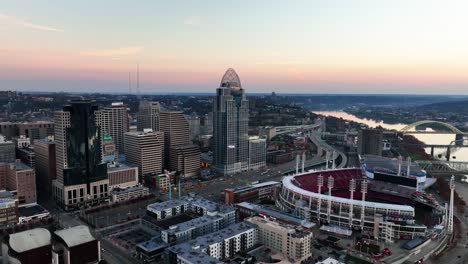 Aerial-view-towards-the-Great-American-ball-park-and-the-tower,-autumn-dusk-in-Cincinnati,-USA