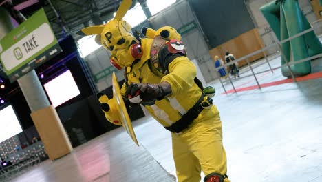 Cinematic-shot-of-a-person-dressed-up-as-Pikachu-at-the-Japan-Expo
