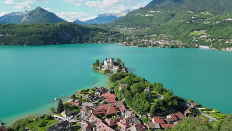 Light-Blue-Lake-Annecy-and-Chateau-Duingt-in-French-Alps---Aerial-Panorama