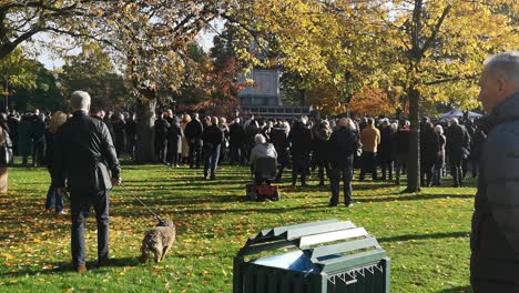 Public-gathering-at-UK-park-memorial-Cenotaph-paying-respect-on-remembrance-Sunday-service
