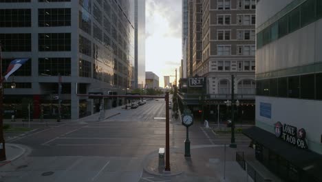 Aerial-low-street-level-shot-of-a-quiet-morning-at-the-Texas-avenue,-in-Houston,-USA