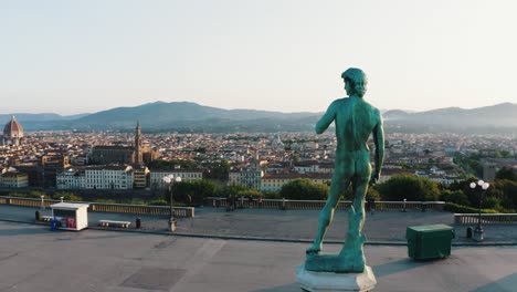 Aerial-Cityscape-Of-Florence-With-A-David-Statue-At-Piazzale-Michelangelo
