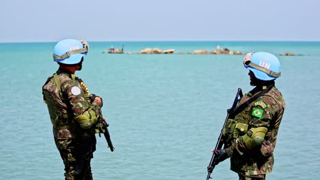 Two-armed-UN-soldiers-from-Brasil-talking-during-peace-keeping-mission-in-Haiti
