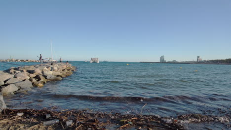 Barcelona-beach-with-the-world-trade-center-in-the-background