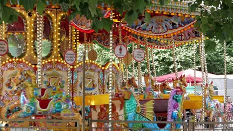 Funfair-carrousel-spins-in-daylight