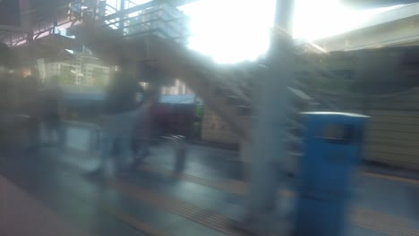 Select-focus-blur-window-of-fast-motion-train-pass-the-station
