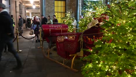 Celebrating-Christmas-within-Covent-Garden-and-Santa,-London,-United-Kingdom