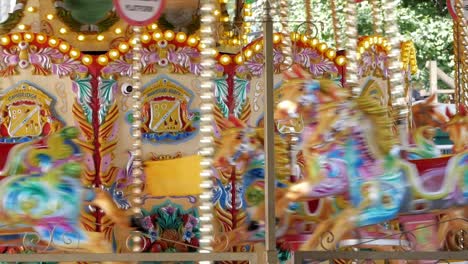 Close-up-of-carousel-amusement-ride-in-street-fair
