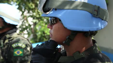 Closeup-with-UN-soldiers-wearing-blue-helmet