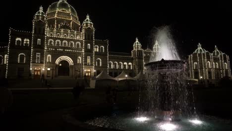 The-Parliament-Building-and-the-seat-of-the-Legislative-Assembly-shines-at-night-fully-illuminated-with-fountain-at-night