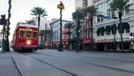 French-Market-Riverfront-street-car-trolley-at-Canal-Street-in-downtown-New-Orleans,-decorated-for-Christmas-holidays