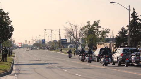 21-September-2022---Funeral-Motorcade-Riding-Past-For-Police-Officer-Andrew-Hong-At-The-Toronto-Police-Services