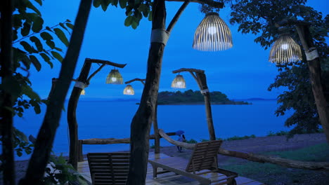 Tropical-resort-sun-beds-at-blue-night
