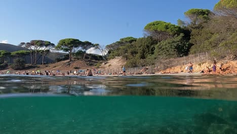 Tourism-on-hot-summer-day-at-Palombaggia-beach-in-south-Corsica-island-in-France