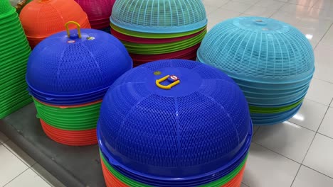 various-colors-of-serving-lids-in-a-brand-new-shop