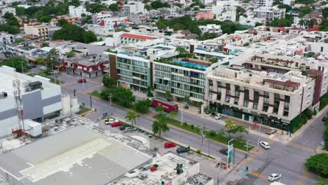 aerial-skyline-view-of-buildings-and-cars-driving-in-downtown-Playa-del-Carmen-Mexico