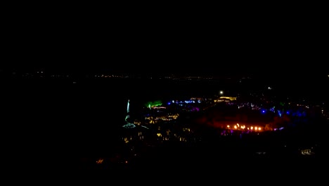 Luminaria-Christmas-festival-of-lights-at-Thanksgiving-Point-in-Lehi,-Utah---aerial-approach