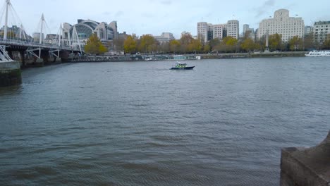 Uber-river-boat-leaving-Westminster-pier-on-river-Thames-in-London,-UK