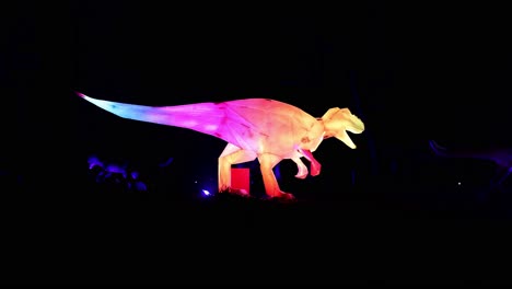 Illuminated-Dinosaur-sculpture-at-Lightopia-in-Crystal-Palace-park,-London