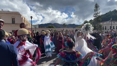 slow-motion-shot-of-bride-dancing-in-front-of-church-in-san-cristobal-de-las-casas-chiapas-mexico