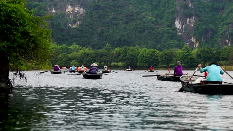 Rowing-Boats-Tours-Taking-Place-Near-Ninh-Binh-For-Tourists-In-Vietnam