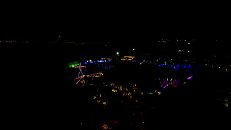 Christmas-light-festival-at-a-garden-park---aerial-parallax-view