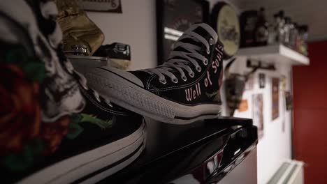 Self-made-all-star-shoe-used-as-decoration-on-a-shelve