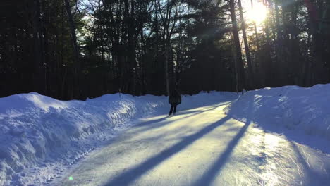 Exterior-wide-shot-of-a-skater-on-the-Arrowhead-Ice-Skating-Trail