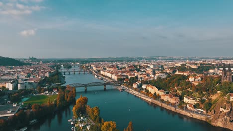 A-drone-view-of-Prague---flying-over-the-Vltava-river-towards-Prague-Castle