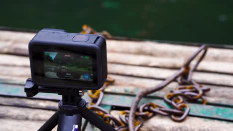 View-Of-GoPro-On-Mini-Tripod-Filming-Timelapse-On-Boat-Trip-In-Vietnam