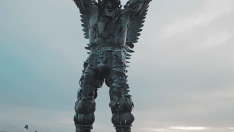 The-impressive-Arcanjo-metal-Archangel-Statue-at-Milfontes-coast