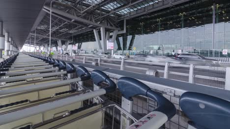 timelapse-view-many-car-arriving-to-departure-terminal-with-many-passenger-at-suvarnabhumi-airport-thailand-reopening-country