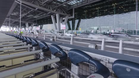 timelapse-view-many-car-arriving-to-departure-terminal-with-many-passenger-at-suvarnabhumi-airport-thailand-reopening-country