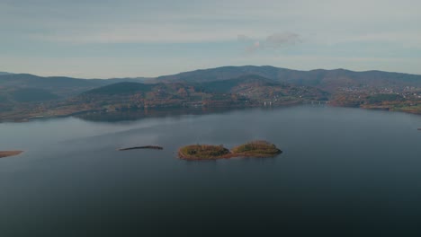 Aerial-View-of-Mysterious-Floating-Lake-Islands-in-Autumn-Season