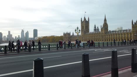 Shot-taken-from-over-Westminster-bridge-with-Big-Ben-visible-in-distance-in-London,-UK-at-daytime