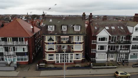 Drone-footage-of-the-migrant-hotels-along-the-North-Parade-in-Skegness,-UK