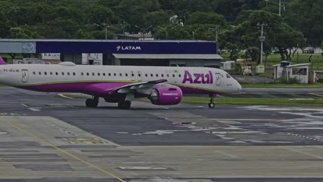 Azul-Airline-aircraft-with-the-pink-and-lavender-colors-ready-for-takeoff