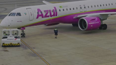 Azul-Airline-airplane-being-pushed-back-for-departure