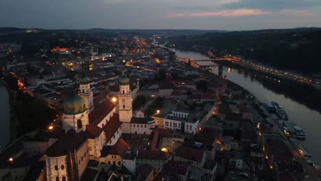 Passau-German-city-at-night-with-orbiting-around-city-cathedral-at-sunset