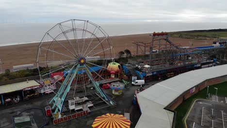 Closed-tourist-attractions-on-a-foggy-morning-drone-video-of-Skegness,-UK