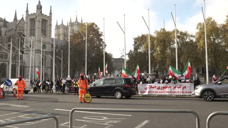 30-November-2022---Traffic-Going-Past-Iran-Protest-Outside-Houses-Of-Parliament-On-Parliament-Square