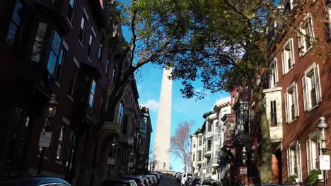 Driving-down-Monument-Avenue-in-the-Boston-suburb-of-Charlestown,-Massachusetts-towards-the-Bunker-Hill-Monument