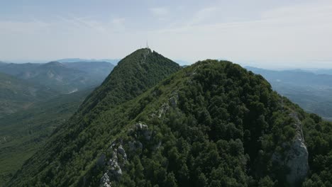 Aerial-shot-moving-past-Dajti-mounatin-in-national-park-near-Tirana,-Albania