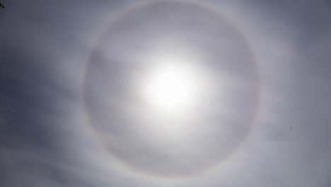 Beautiful-Sun-Halo-Phenomenon-With-Thin-Layer-Of-Clouds
