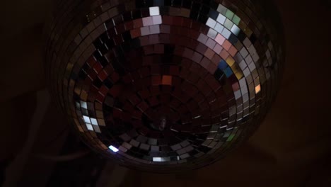 Slow-motion-shot-of-Mirror-ball-spinning,-Close-up